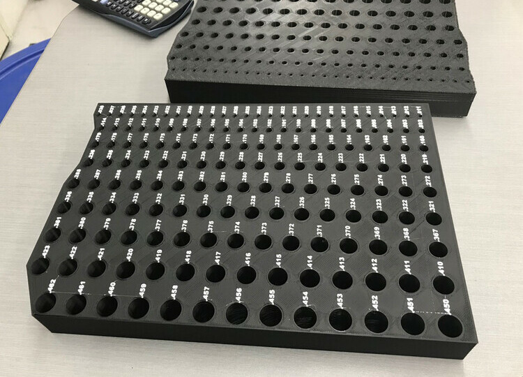 A custom 3D printed gauge pin holder